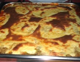 Repollo con salsa de tomate y bechamel