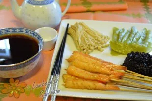 Langostinos marinados en salsa teriyaki