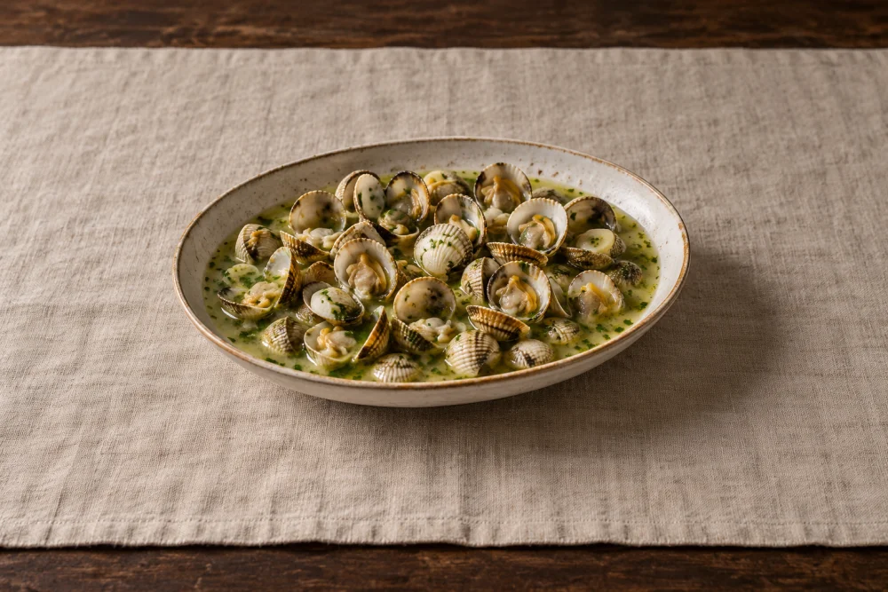 Berberechos en salsa verde