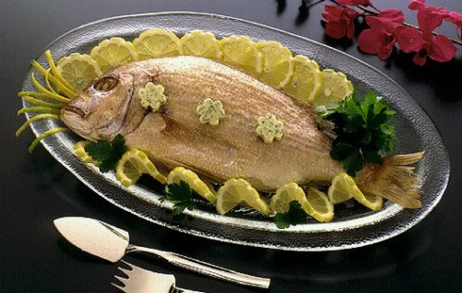 Dentón con mantequilla de anchoas