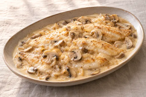 Filetes de gallo en salsa de riesling con champiñones
