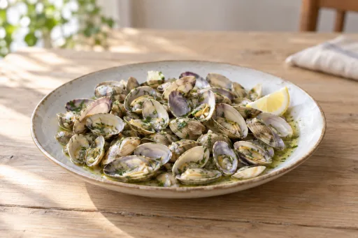 Tellinas en salsa verde